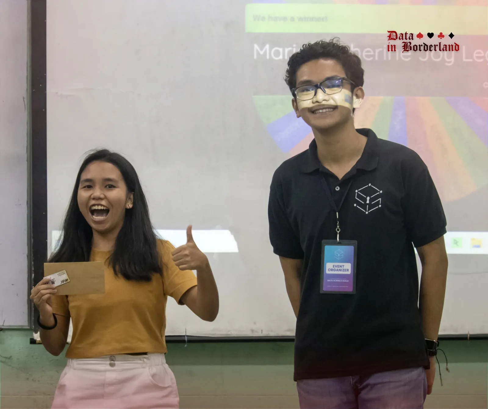 Participants reacting during a round